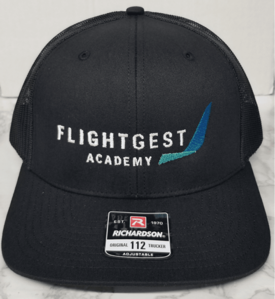 A black hat with the words flightgest academy on it.