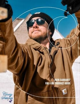 Man wearing sunglasses and Carhartt jacket